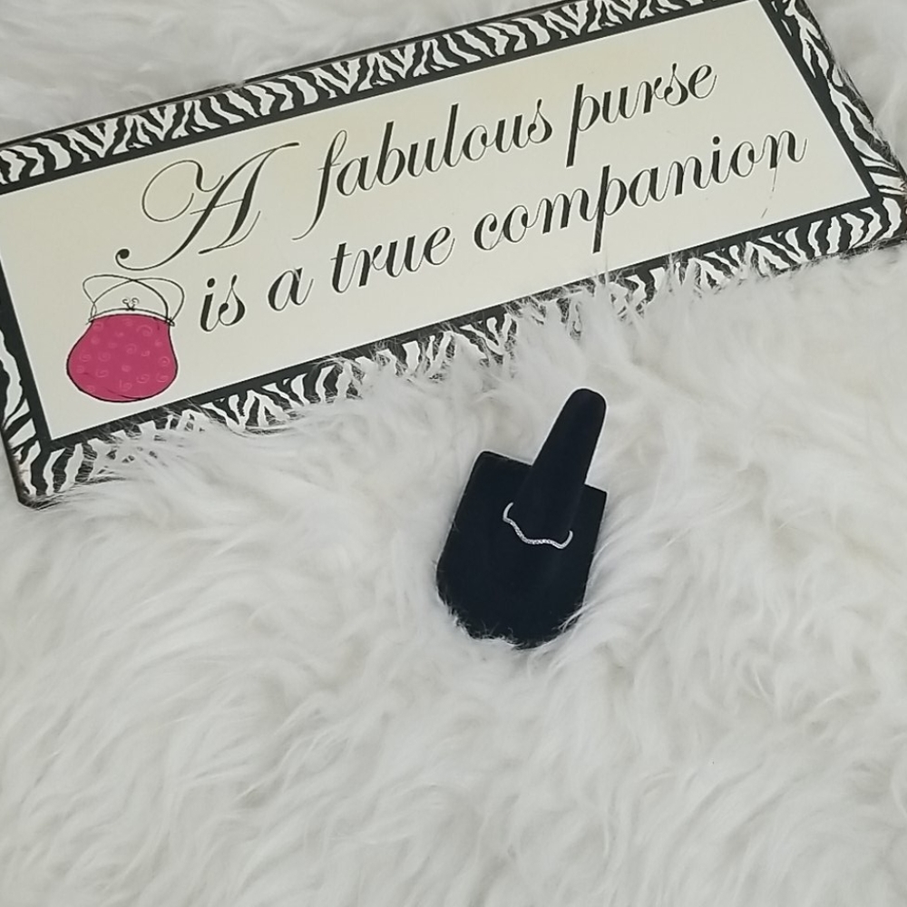 Silver &  cubic zirconia ring.